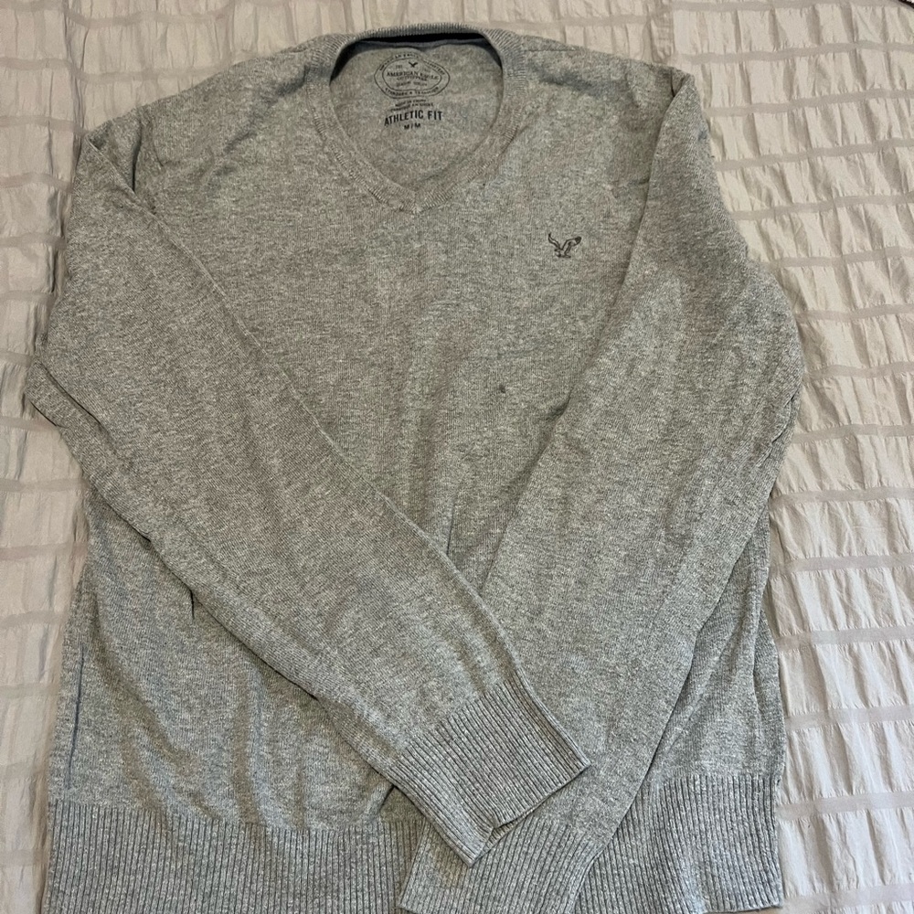 grey v neck sweater